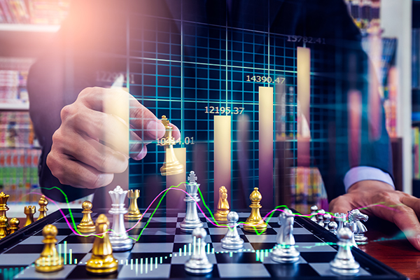 Chess game on chess board on stock market or forex trading graph
